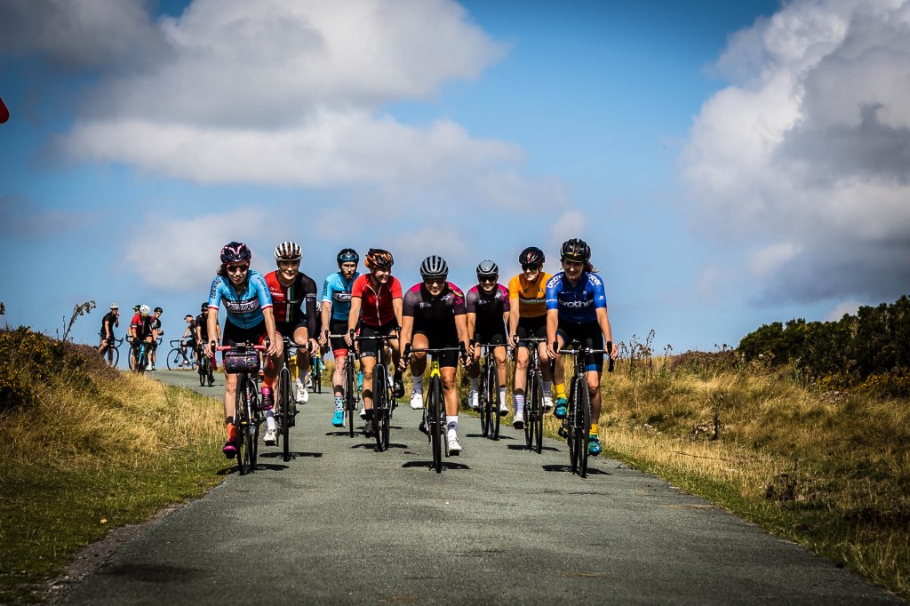 Female cyclists riding near Llangollen, North Wales